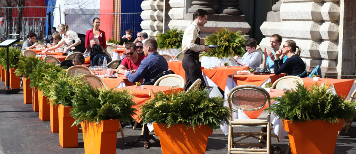 People enjoy lunch meal at restaurant in Moscow